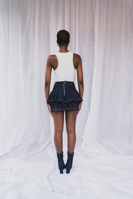 THE "Dip-It-Low" PLEATED SKIRT ’24